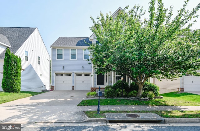 1007 Wright Ct, Fredericksburg, VA 22401 - view of front of home featuring an attached garage, concrete driveway, and a shingled roof