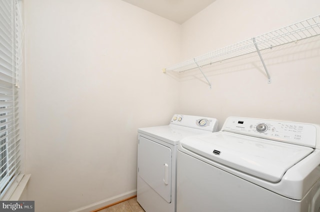 1007 Wright Ct, Fredericksburg, VA 22401 - washroom with washing machine and clothes dryer and baseboards