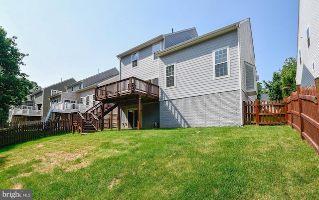 1007 Wright Ct, Fredericksburg, VA 22401 - back of property with a deck, stairs, and a fenced backyard