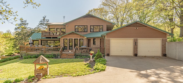 view of front facade featuring a front yard and a wooden deck