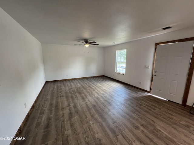 interior space featuring dark hardwood / wood-style flooring and ceiling fan