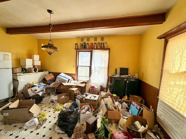 miscellaneous room with beam ceiling