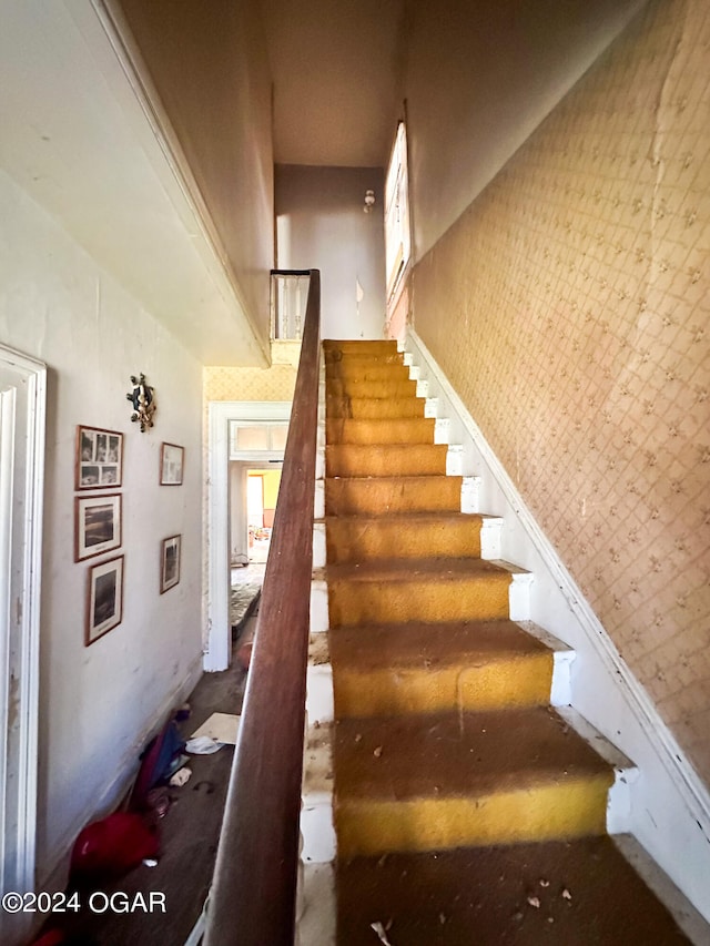 stairs with a high ceiling