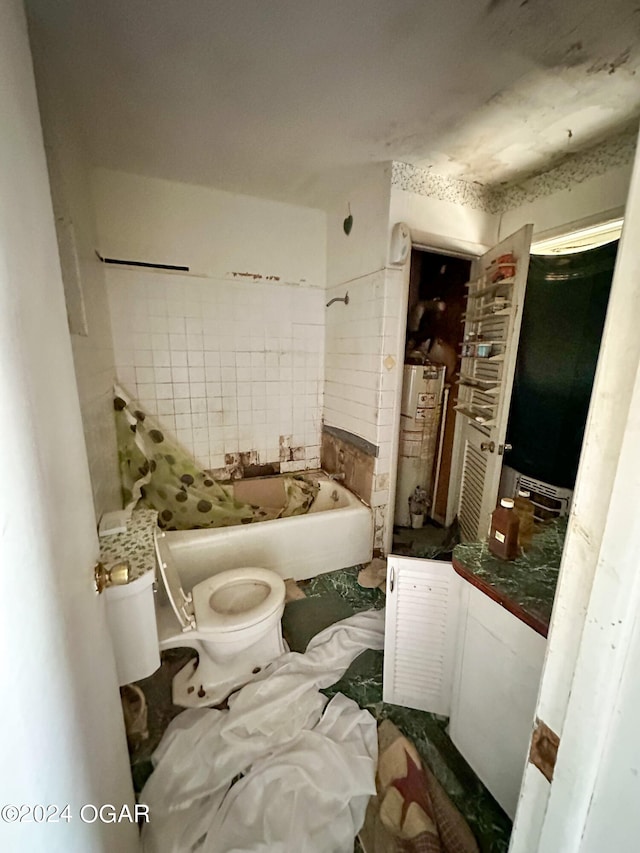 bathroom featuring water heater and toilet