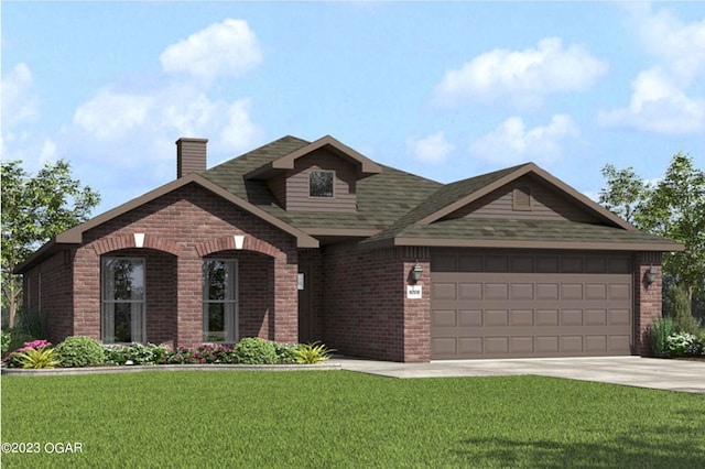 view of front of home with a garage and a front yard