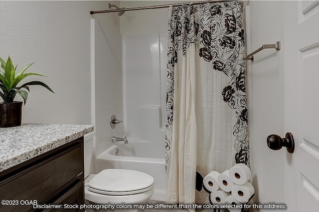 full bathroom featuring shower / tub combo with curtain, vanity, and toilet