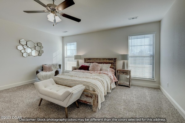 carpeted bedroom featuring ceiling fan