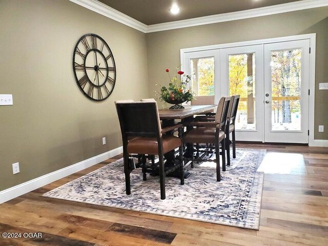 21942 Mill Creek Cir, Shell Knob, MO 65747 - dining area featuring french doors, crown molding, and wood-type flooring