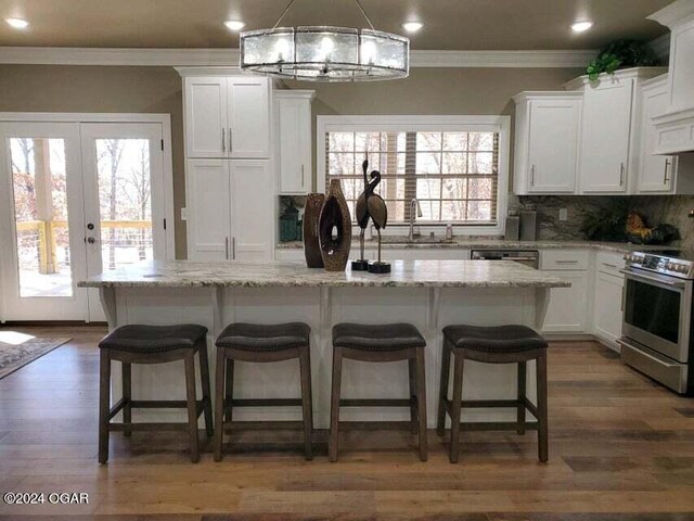 21942 Mill Creek Cir, Shell Knob, MO 65747 - kitchen featuring white cabinets, stainless steel range, and dark wood-type flooring