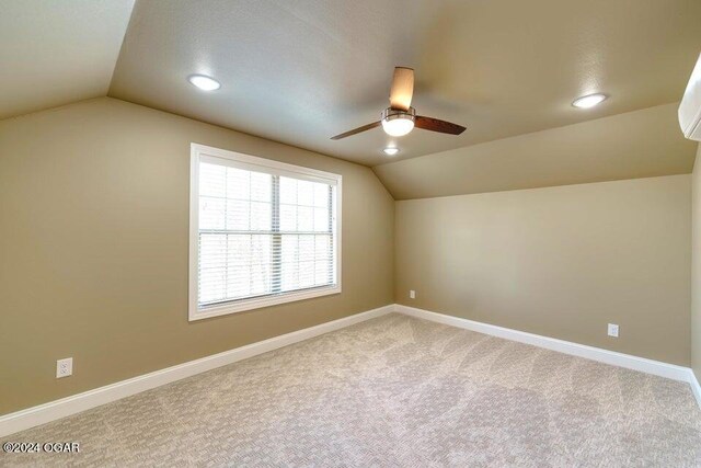21942 Mill Creek Cir, Shell Knob, MO 65747 - carpeted empty room with lofted ceiling and ceiling fan