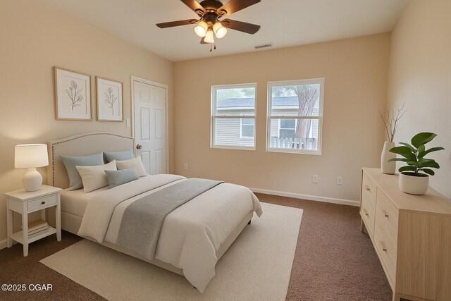 2311 Bird Ave, Joplin, MO 64804 - bedroom with baseboards, visible vents, and dark colored carpet
