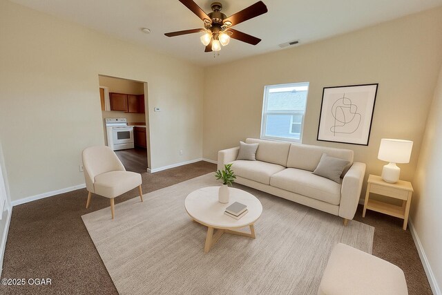 2311 Bird Ave, Joplin, MO 64804 - carpeted living area featuring baseboards, a ceiling fan, and visible vents