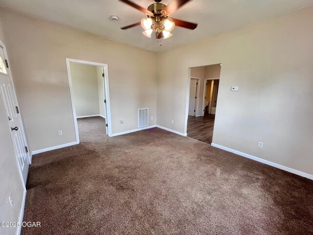2311 Bird Ave, Joplin, MO 64804 - carpeted spare room with visible vents, a ceiling fan, and baseboards