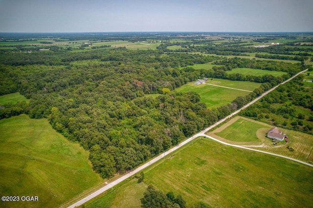 birds eye view of property featuring a rural view