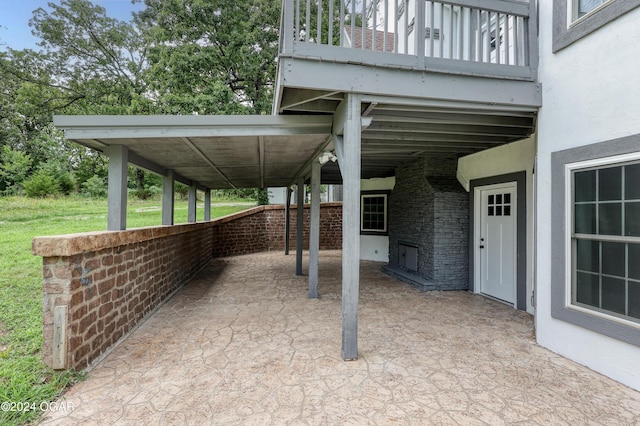 view of patio / terrace with a balcony