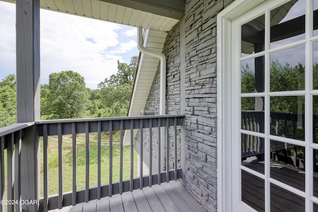 deck featuring a lawn