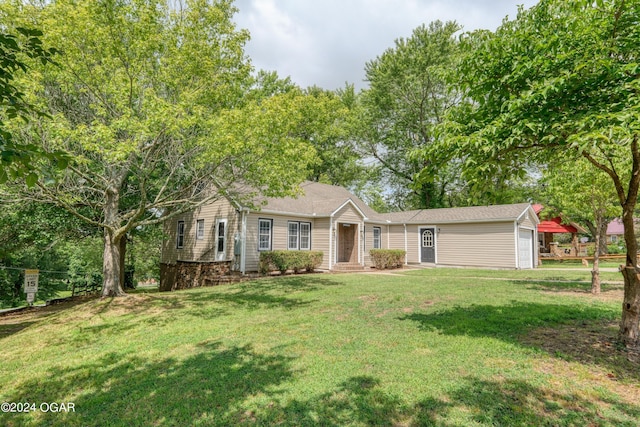 ranch-style house featuring a front yard