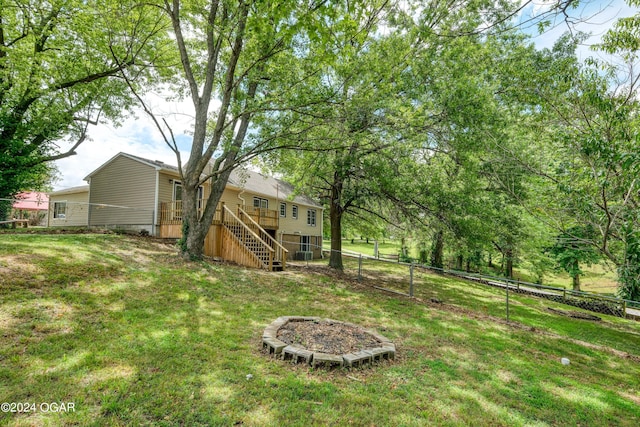 view of yard featuring a wooden deck