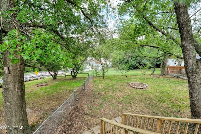 view of yard with a rural view