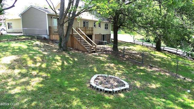 view of yard featuring a deck