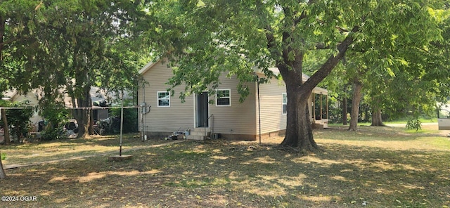 exterior space featuring a front lawn