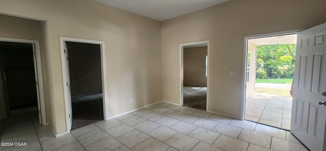 interior space with light tile patterned floors