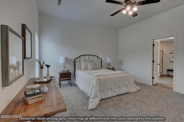 carpeted bedroom featuring ceiling fan