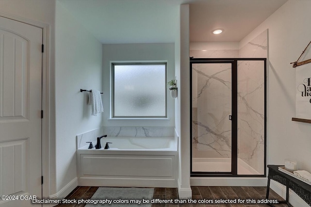 2323 N Miller Ave, Joplin, MO 64801 - full bathroom featuring wood tiled floor, a bath, baseboards, and a marble finish shower