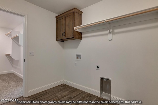 laundry area with cabinets, hookup for an electric dryer, dark colored carpet, and washer hookup