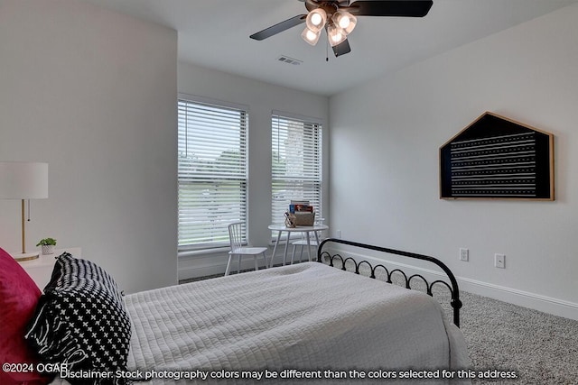 2323 N Miller Ave, Joplin, MO 64801 - bedroom featuring carpet floors, visible vents, a ceiling fan, and baseboards