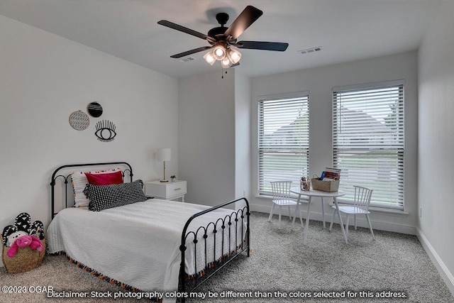 carpeted bedroom with ceiling fan