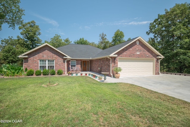 7221 State Highway 90, Pineville, MO 64856 - ranch-style home featuring a front yard, roof with shingles, brick siding, concrete driveway, and an attached garage