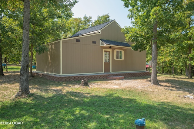 view of property exterior featuring a yard