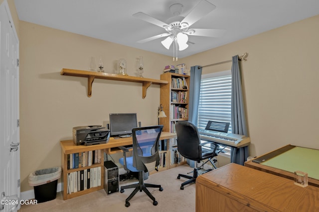 office area with ceiling fan and light colored carpet