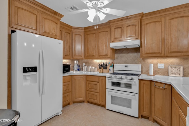 kitchen featuring white appliances, ceiling fan, decorative backsplash, and light tile patterned floors