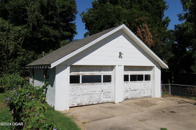 detached garage with fence