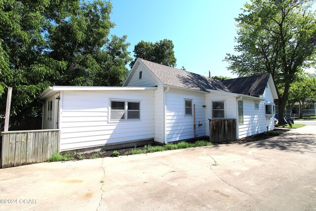 back of property featuring a patio area