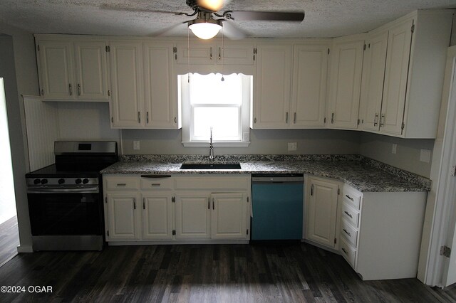 kitchen featuring sink, appliances with stainless steel finishes, dark wood-type flooring, ceiling fan, and white cabinets