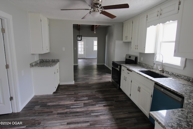 kitchen with dark wood-style flooring, a sink, white cabinetry, black dishwasher, and stainless steel electric stove