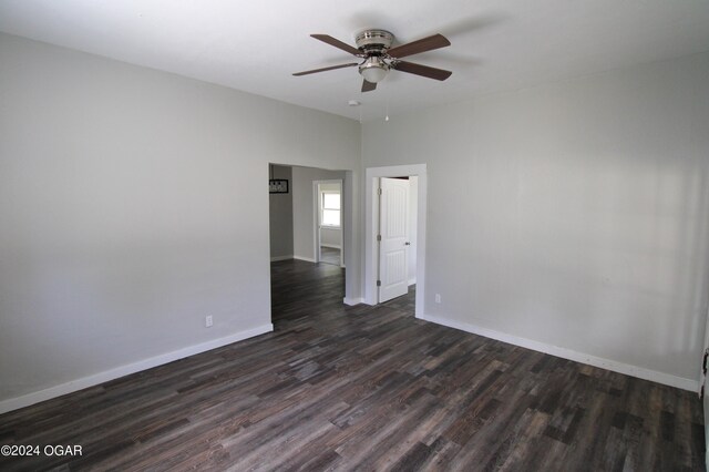 empty room featuring ceiling fan and hardwood / wood-style floors