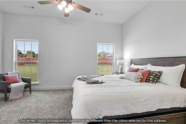 bedroom with ceiling fan and carpet floors