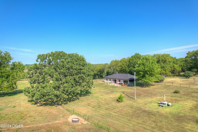 view of yard with a rural view