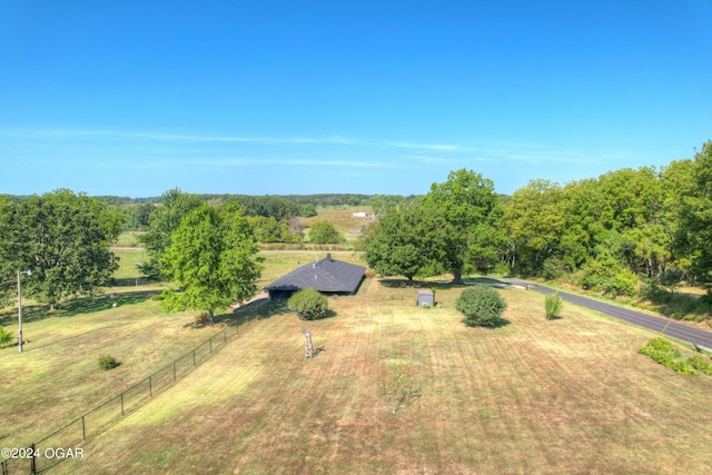 birds eye view of property with a rural view