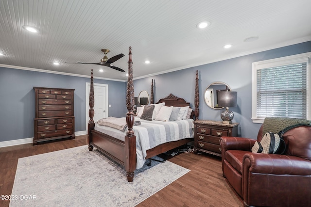 bedroom with ceiling fan, crown molding, and dark hardwood / wood-style floors