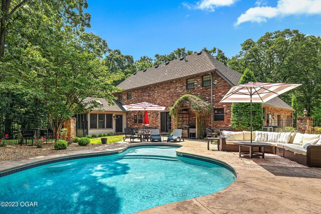 view of pool featuring a patio and an outdoor hangout area