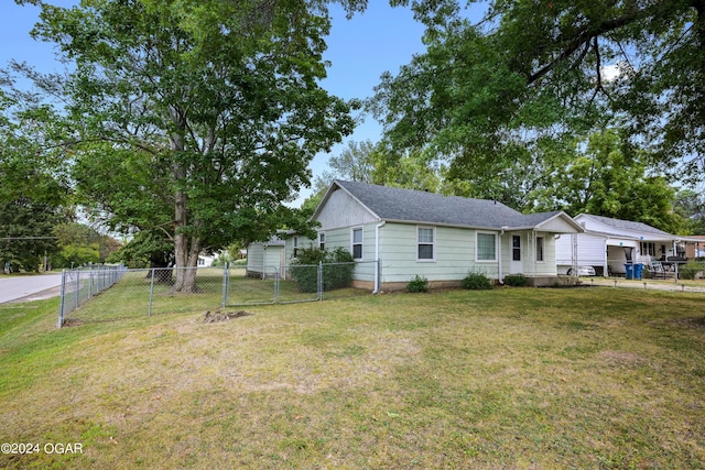 view of front of home with a front yard