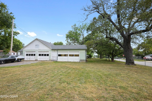 view of side of property with a lawn