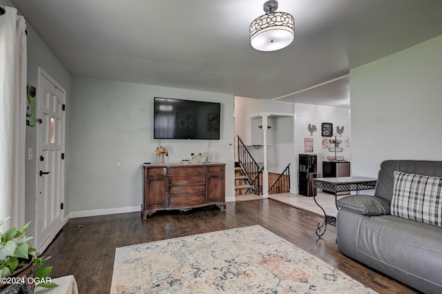 living room featuring dark hardwood / wood-style floors