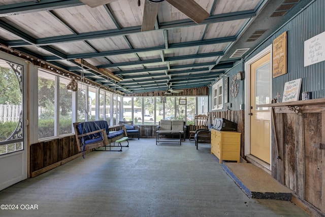 unfurnished sunroom featuring a healthy amount of sunlight