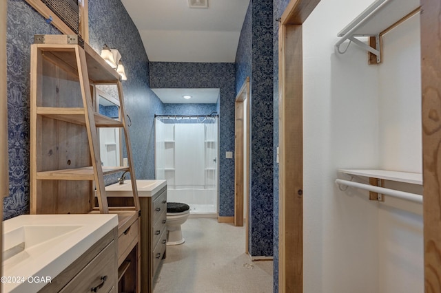 bathroom with vanity, toilet, and a shower with curtain